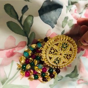 Beautiful earnings, necklace and jhumka. Gold with colorful beads, heavy jewelry